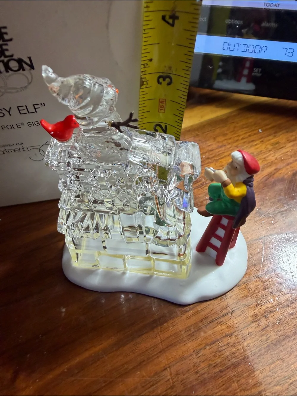 Department 56 A busy elf Sculpture with Holiday Figurines